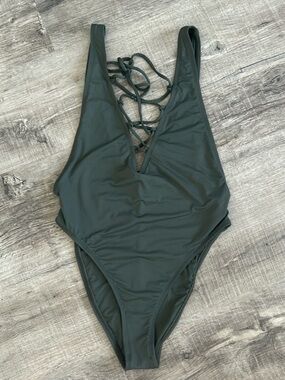 Dippin' Daisy's high leg cut lace up front one piece size s